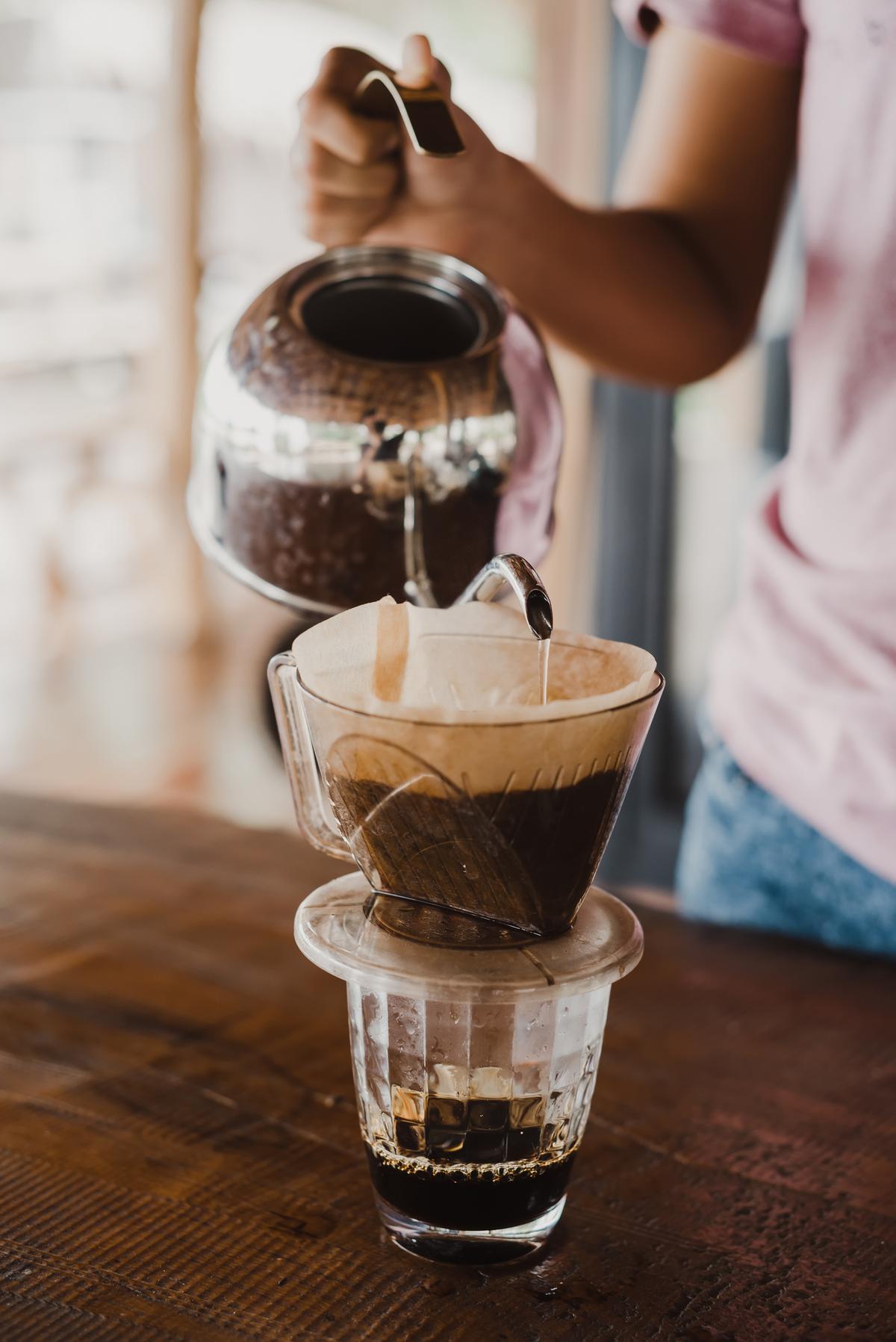 A pour-over involves more steps and tools, but the resulting brew is much more flavorful, according to coffee experts. (somboon kaeoboonsong/iStock/Getty Images Plus)