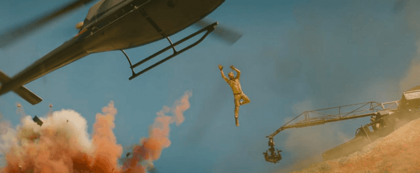 Stuntman Colt Seavers (Ryan Gosling) does a flying leap, in "The Fall Guy." (Universal Pictures)