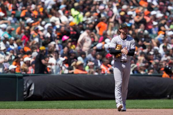 Rockies third baseman Ryan McMahon reacts after committing a costly error against the Giants in San Francisco on May 19, 2024. (Godofredo A. Vásquez/AP Photo)