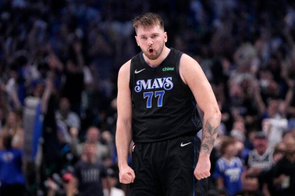 Dallas Mavericks guard Luka Doncic celebrates after scoring against the Oklahoma City Thunder in Game 6 of an NBA playoff series in Dallas on May 18, 2024. (Tony Gutierrez/AP Photo)