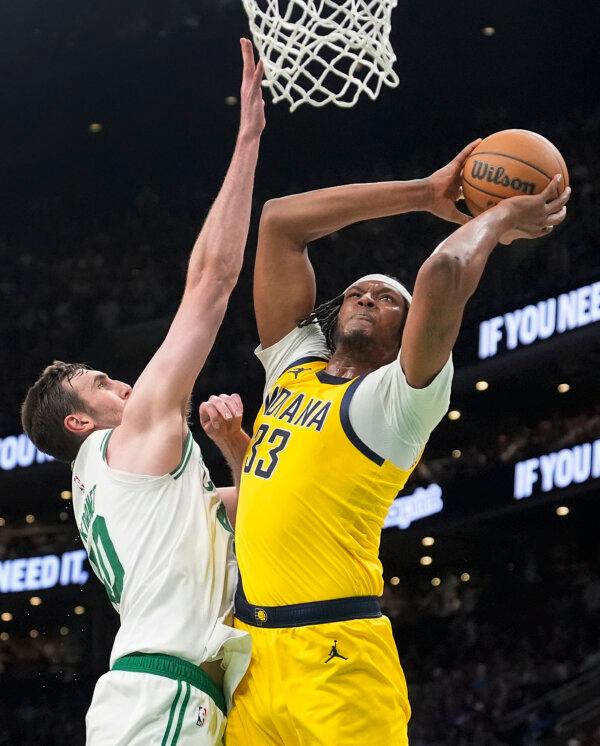 The Pacers' Myles Turner goes up for a shot against Luke Kornet of the Celtics during Game 1 of the NBA Eastern Conference finals in Boston on May 21, 2024. (Charles Krupa/AP Photo)