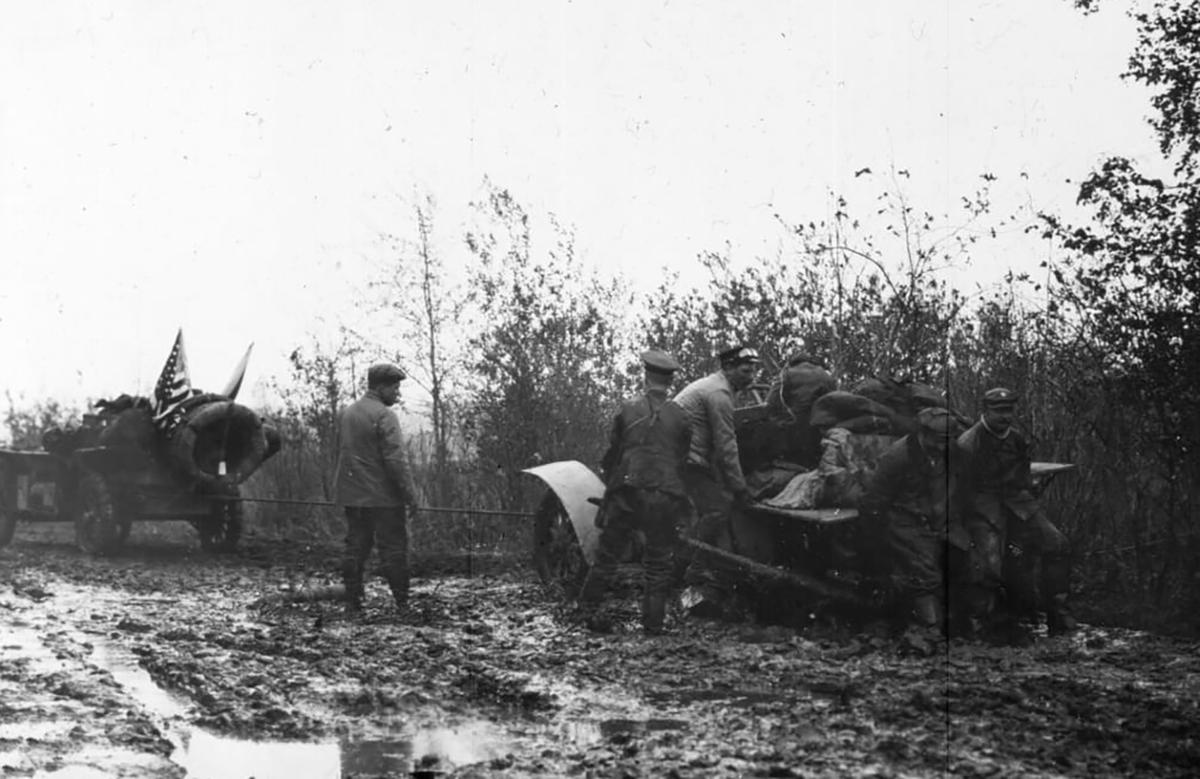 The Thomas Flyer team hauling the German Protos car out of the mud in Russia. Gift of the Family of Henry Austin Clark, Jr., The Henry Ford, Dearborn, Mich. (The Henry Ford Museum)