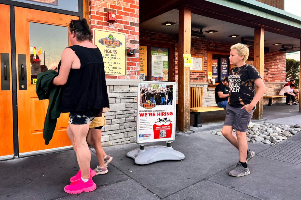 A hiring sign at a restaurant in Columbia, Md., on June 15, 2024. (Madalina Vasiliu/The Epoch Times)