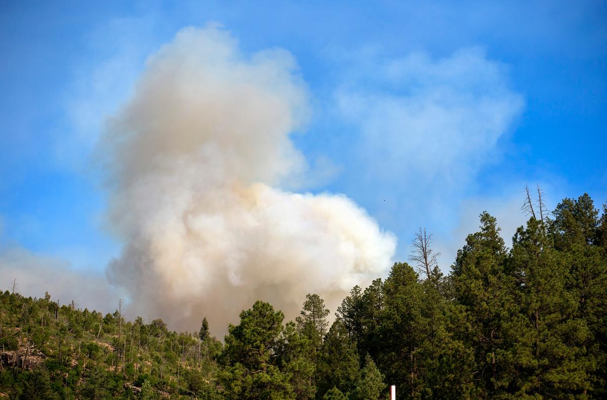 Cooler Temps and Rain Could Help Corral Blazes That Forced Thousands to Flee New Mexico Village