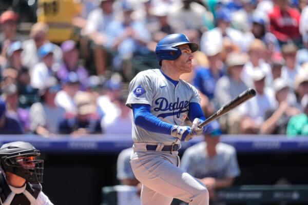 Freddie Freeman of the Dodgers follows the flight of his home run against the Rockies in Denver on June 20, 2024. (David Zalubowski/AP Photo)
