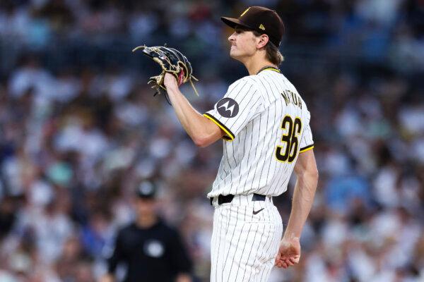 Padres pitcher Adam Mazur grimaces after giving up a two-run home run to the Brewers' Willy Adames in San Diego on June 20, 2024. (Derrick Tuskan/AP Photo)