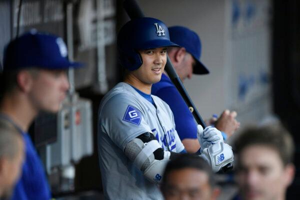 The Dodgers' Shohei Ohtani looks on from the dugout during a game against the White Sox in Chicago on June 24, 2024. (Paul Beaty/AP Photo)