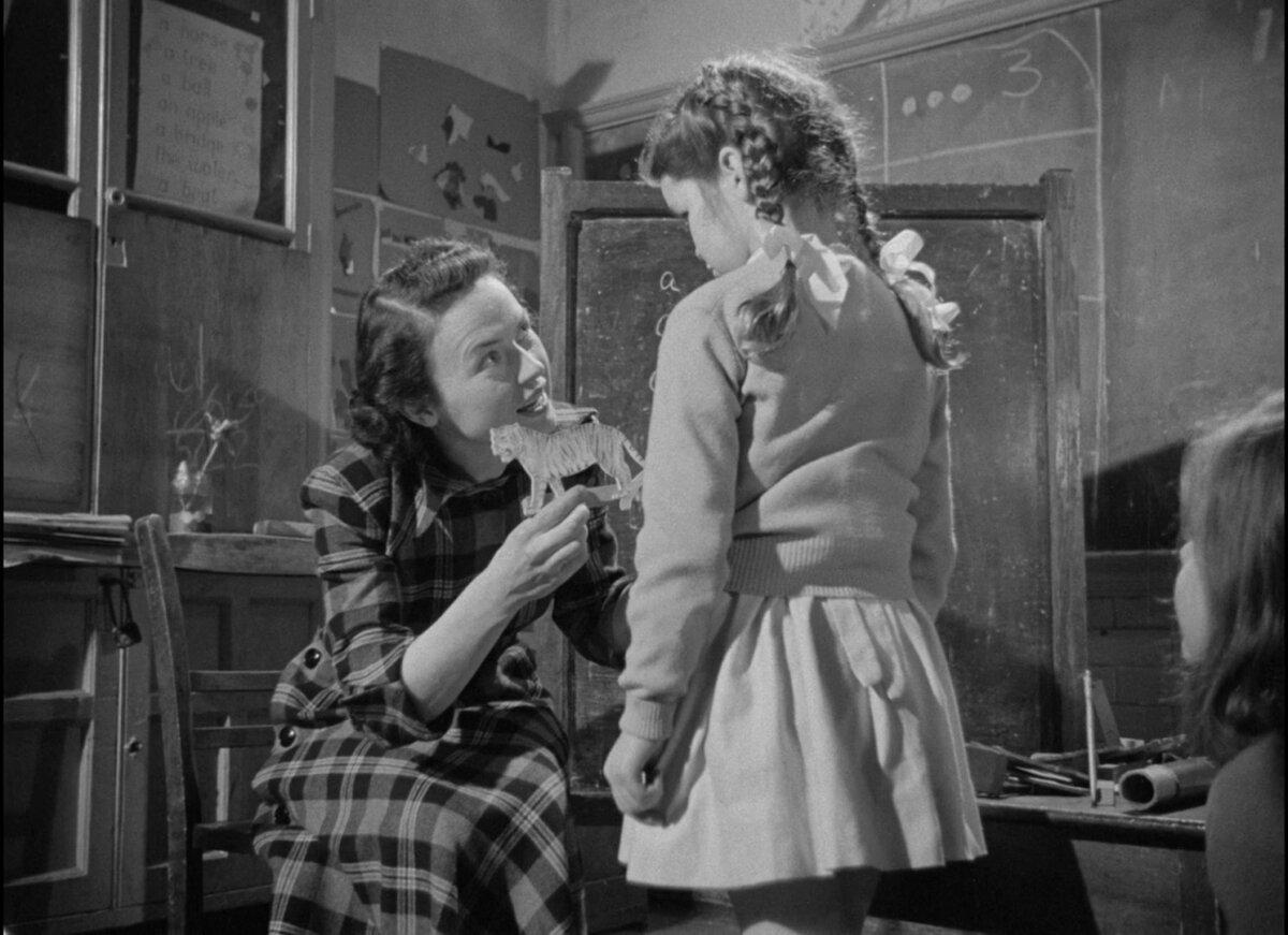 Dr. Jane Ellis (Nancy Price) works with Mandy Garland (Mandy Miller), in "Mandy." (Ealing Studios)