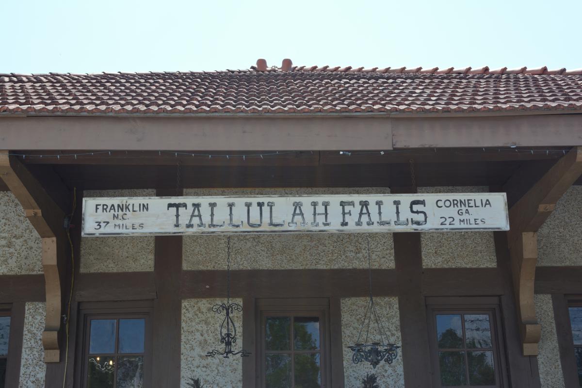 The Tallulah Falls train depot sign provided travelers with directions to the nearest towns. (Deena C. Bouknight)