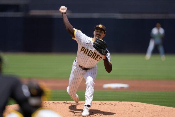Padres pitcher Dylan Cease works against the Nationals in San Diego on June 26, 2024. (Gregory Bull/AP Photo)