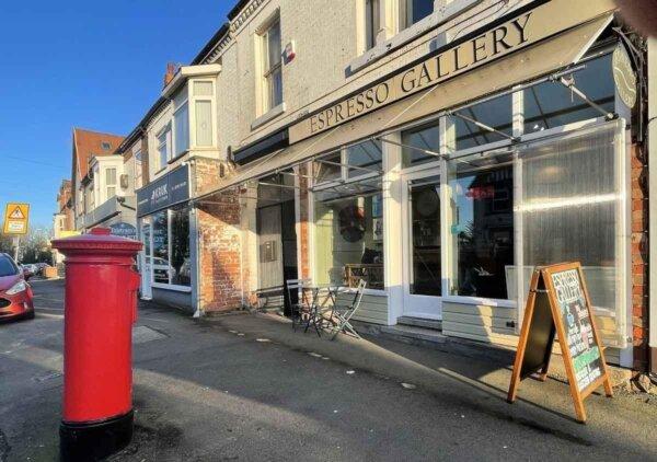 Eddie Chan took over a British community coffee shop, named it “Espresso Gallery,” to continue his coffee dream in a foreign country. (Courtesy of Eddie Chan)