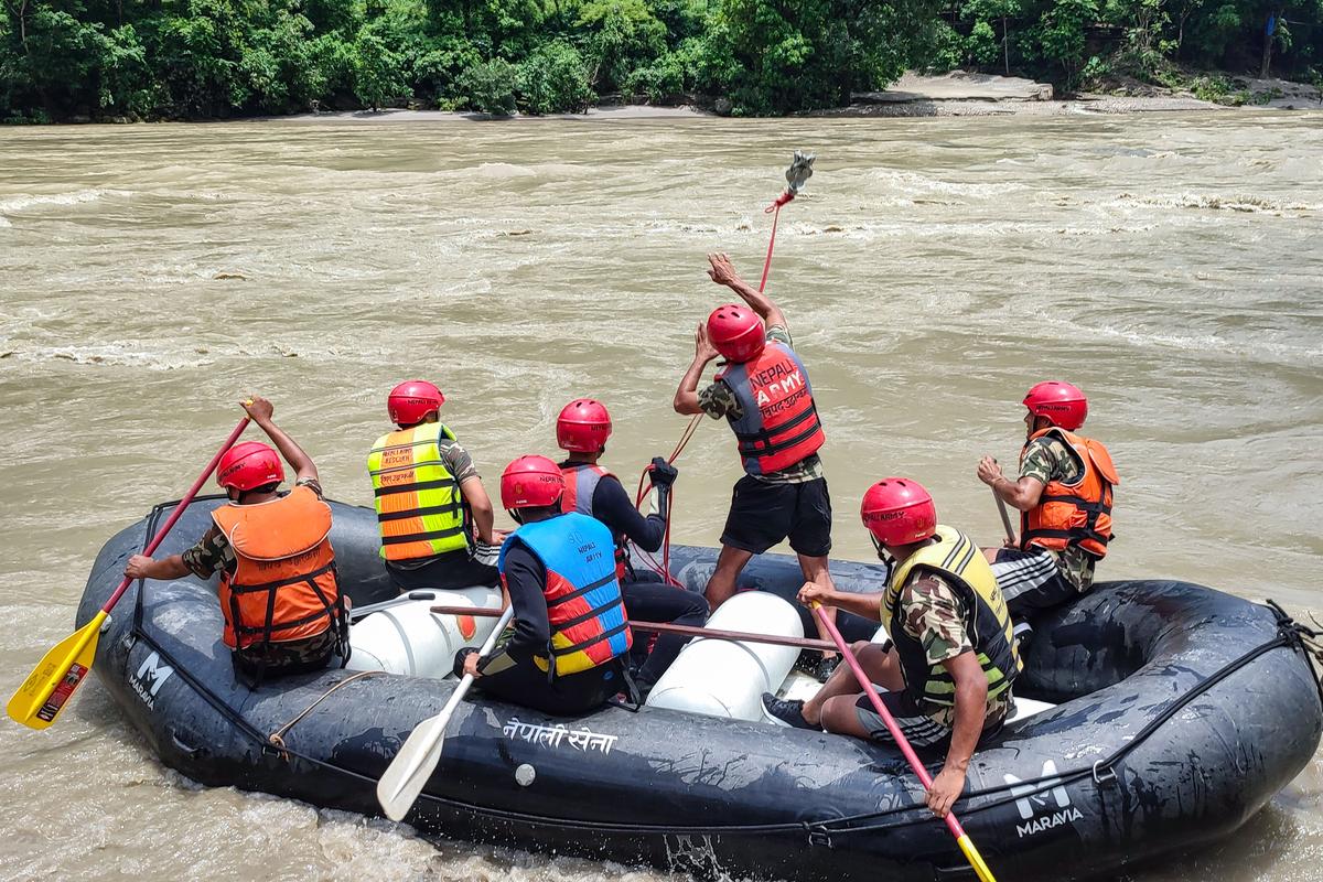 Rescuers in Nepal Recover 11 Bodies After Landslide Swept 2 Buses Full of People Into River