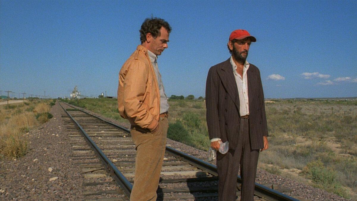 Walt (Dean Stockwell, L) and Travis Henderson (Harry Dean Stanton) begin their healing journey, in “Paris, Texas.” (Road Movies)