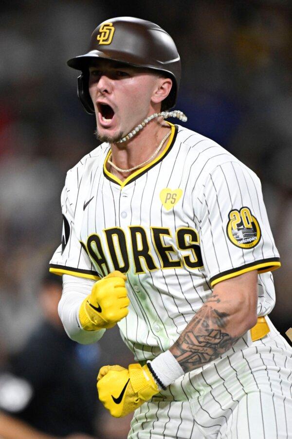 Padres rookie Jackson Merrill is pumped after hitting a tying, ninth-inning home run against the Dodgers in San Diego on July 30, 2024. (Denis Poroy/AP Photo)