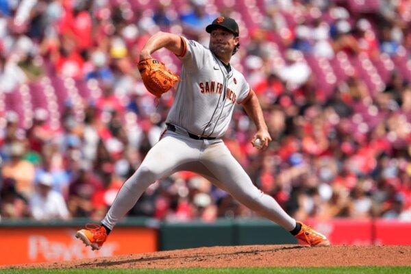 Giants pitcher Robbie Ray throws against the Reds in Cincinnati on Aug. 4, 2024. (Jeff Dean/AP Photo)