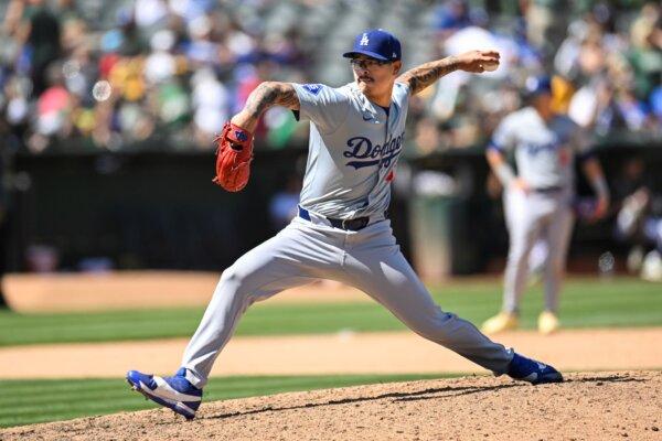 Dodgers reliever Anthony Banda works a perfect ninth inning for a save against the A's in Oakland, Calif., on Aug. 4, 2024. (Eakin Howard/AP Photo)