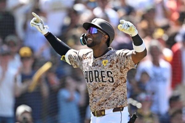 The Padres' Jurickson Profar is pumped after hitting a home run against the Rockies in San Diego on Aug. 4, 2024. (Denis Poroy/AP Photo)