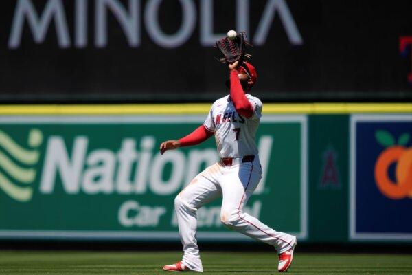 Angels right fielder Jo Adell settles under a fly ball off the bat of the Mets' Jesse Winker in Anaheim, Calif., on Aug. 4, 2024. (Ryan Sun/AP Photo)