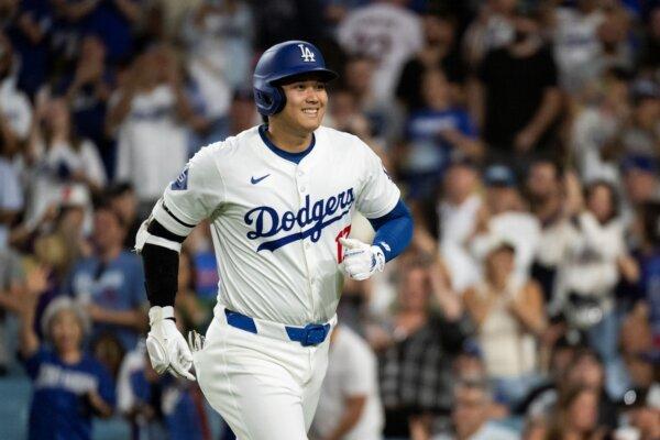 Dodgers slugger Shohei Ohtani jogs back to the dugout after hitting a home run against the Phillies in Los Angeles on Aug. 5, 2024. (Kyusung Gong/AP Photo)