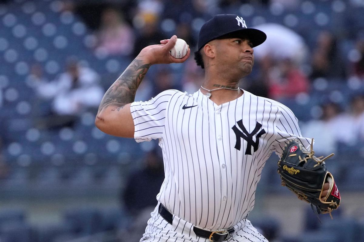 Gil Battles Through Chill to Pitch Yankees Past Angels in Opener of Doubleheader