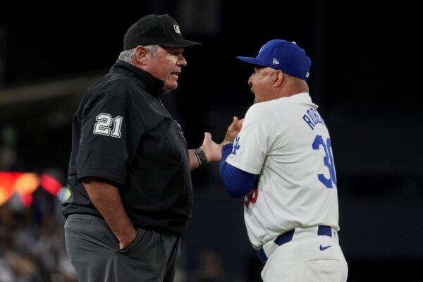 A sixth-inning argument with umpire Hunter Wendelstedt results in Dodgers Manager Dave Roberts being ejected from a game against the Phillies in Los Angeles on Aug. 7, 2024. (Eric Thayer/AP Photo)