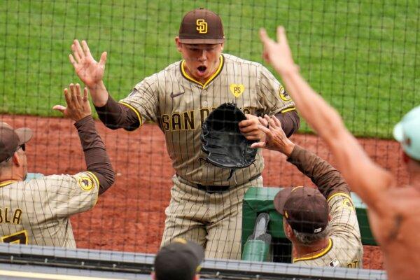 Padres reliever Yuki Matsui is pumped up after getting the final out of the sixth inning against the Pirates in Pittsburgh on Aug. 8, 2024. (Gene J. Puskar/AP Photo)