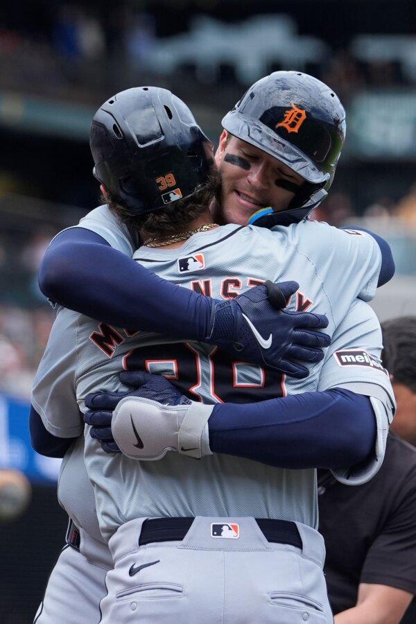 Dillon Dingler (R) embraces Tigers teammate Zach McKinstry after hitting his first major-league home run against the Giants in San Francisco on Aug. 11, 2024. (Godofredo A. Vásquez/AP Photo)