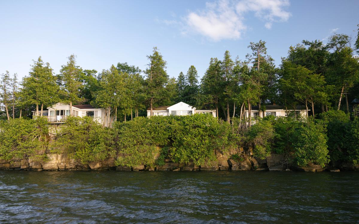 What makes Basin Harbor Resort unique is that most guests stay with their families in modernized cabins in the Vermont forest with direct views of jaw-dropping sunsets over Lake Champlain. (Basin Harbor Resort)