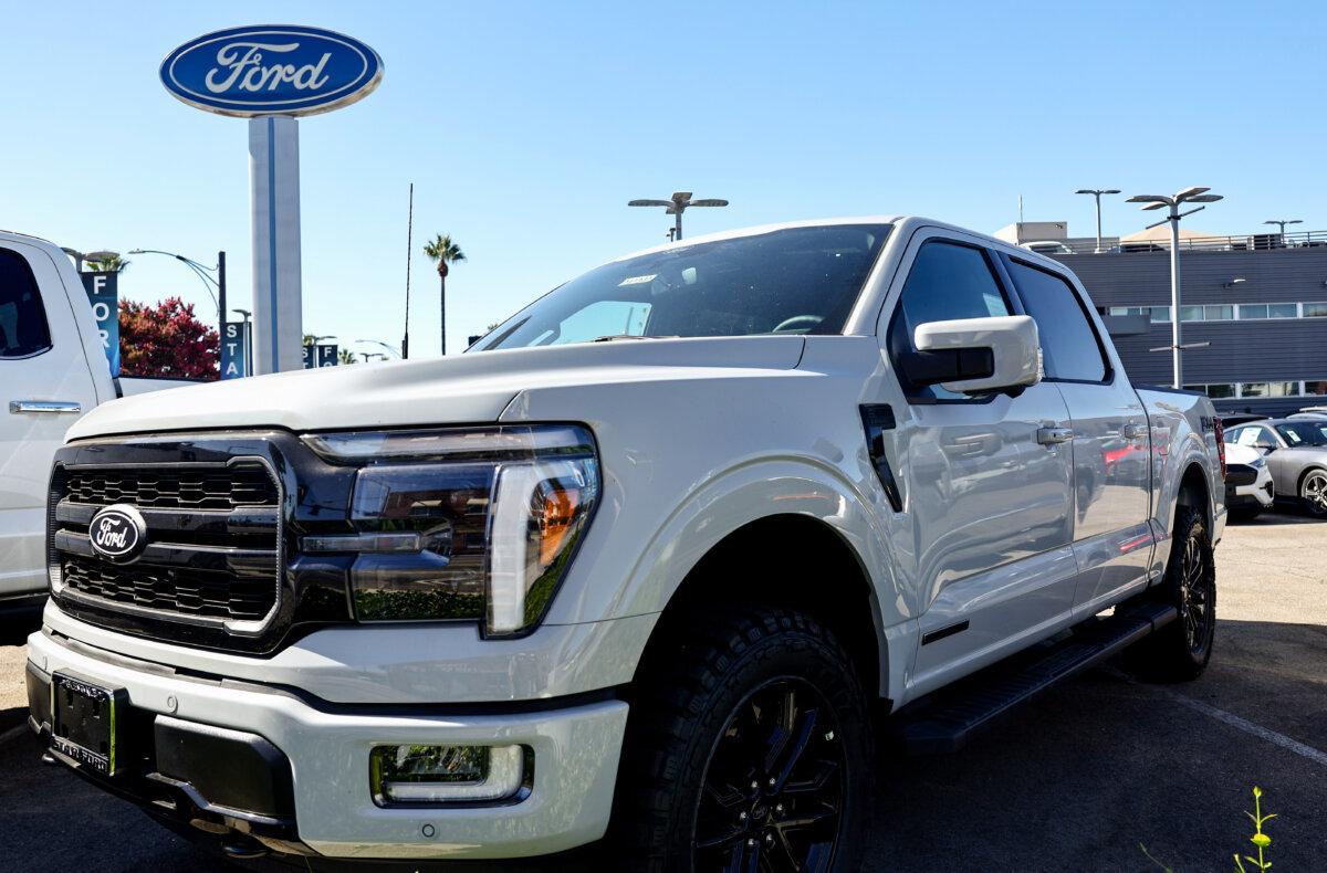 A Ford F-150 Lariat PowerBoost hybrid pickup truck is displayed for sale at a Ford dealership in Glendale, Calif., on Aug. 21, 2024. (Mario Tama/Getty Images)