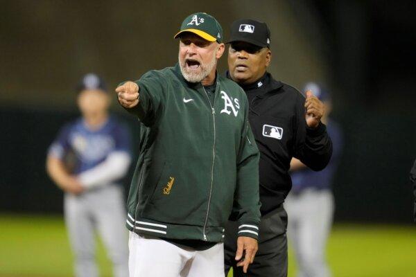 A's Manager Mark Kotsay (L) gestures in front of umpire Laz Diaz while drawing an ejection against the Rays in Oakland, Calif., on Aug. 21, 2024. (Jeff Chiu/AP Photo)