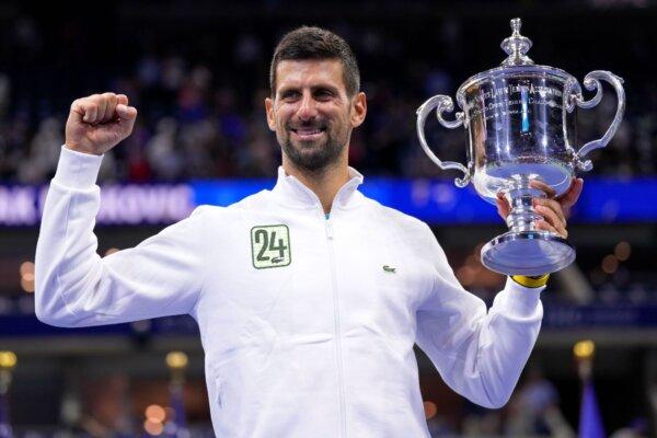 Novak Djokovic holds the U.S. Open championship trophy after defeating Daniil Medvedev in the men's singles final in New York on Sept. 10, 2023. (Manu Fernandez/AP Photo)