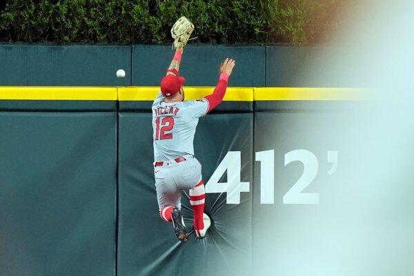 Angels center fielder Kevin Pillar is unable to catch a home run hit by the Tigers' Riley Greene in Detroit on Aug. 27, 2024. (Carlos Osorio/AP Photo)