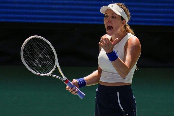 Danielle Collins, who has announced her retirement at season's end, reacts during a first-round U.S. Open loss to Caroline Dolehide in New York on Aug. 27, 2024. (Seth Wenig/AP Photo)