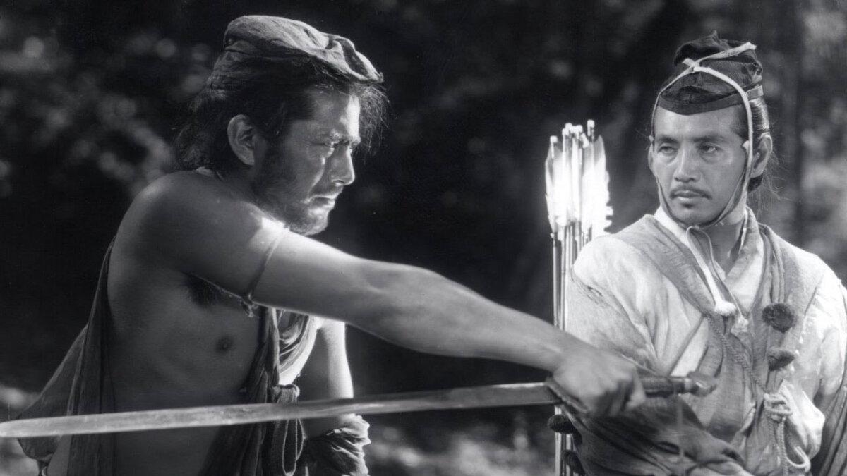 Tajomaru (Toshiro Mifune, L) and Takehiro (Masayuki Mori) battle to the death, in “Rashomon.” (Criterion Collection)