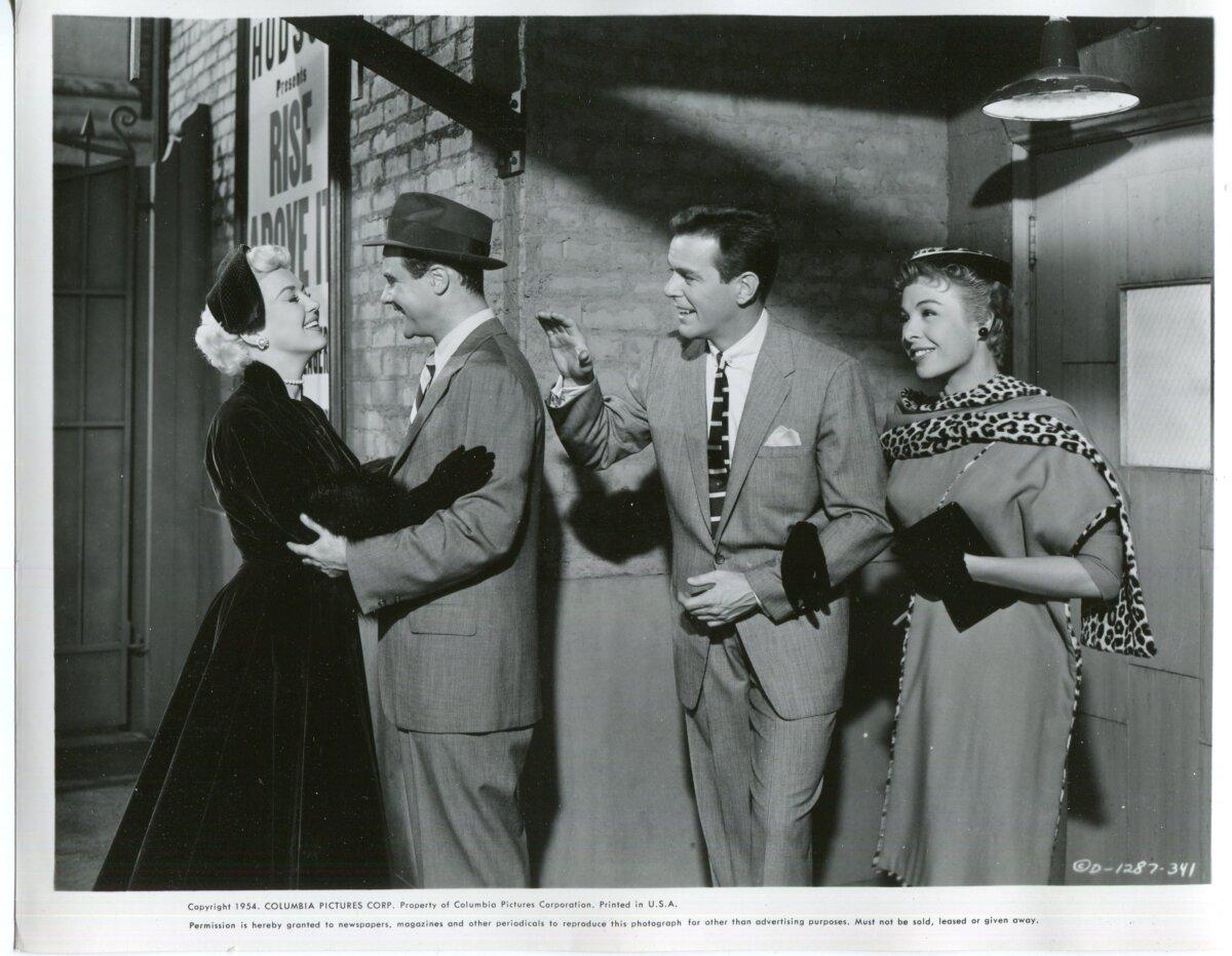 (L–R) Julie Lowndes (Betty Grable), Marty Stewart (Jack Lemmon), Vernon Lowndes (Gower Champion), and Gwen Howard (Marge Champion), in “Three For the Show.” (Columbia Pictures)