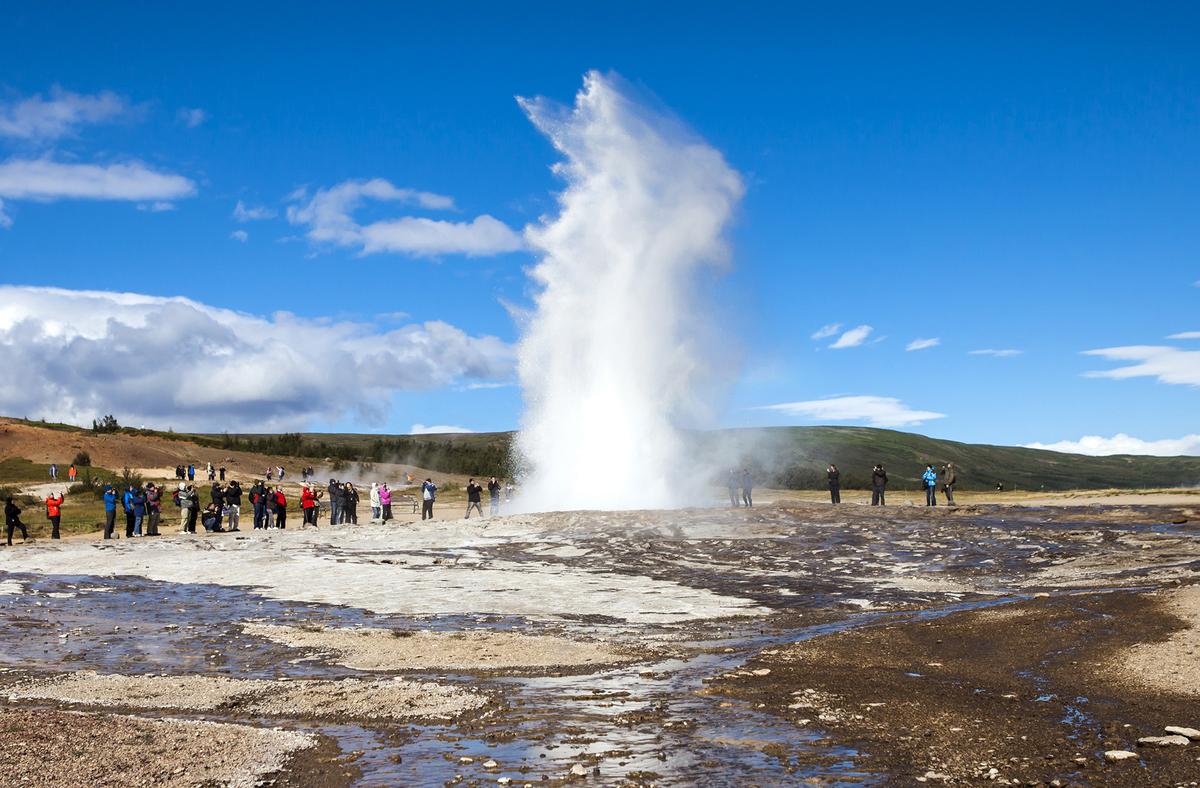 Geysers in the Geysir Hot Spring Area can spout water up to 100 feet into the air. (MarcAndreLeTourneux/Shutterstock)
