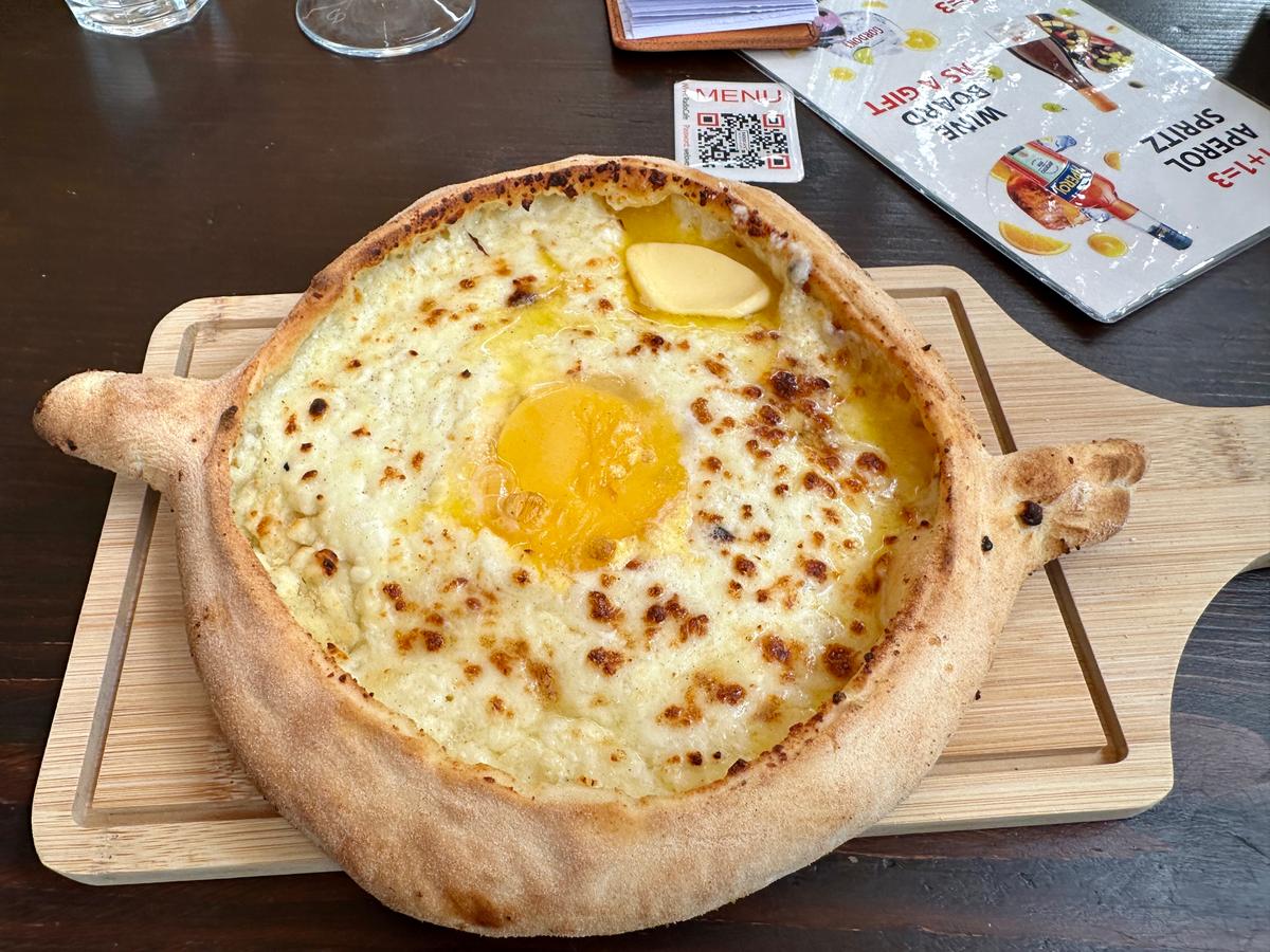 Khachapuri, an egg-and-cheese filled pastry. (Tim Johnson)