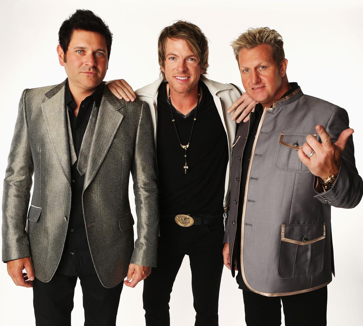 (L–R) Jay DeMarcus, Gary LeVox and Joe Don Rooney pose in the Wonderwall Portrait Studio during the 2012 CMT Music awards in Nashville. ( Christopher Polk/Getty Images)