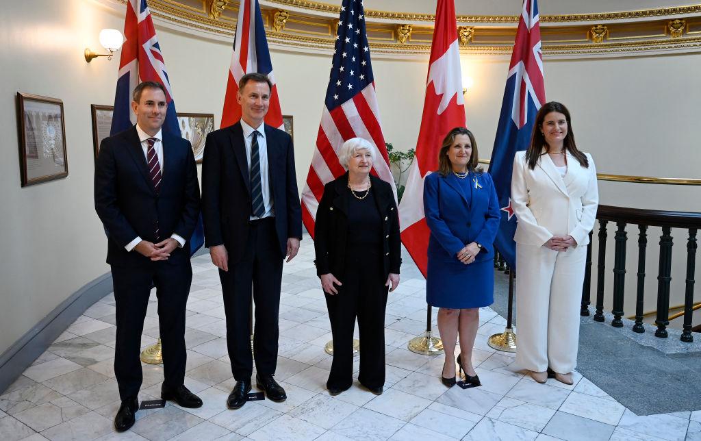 (L–R) Australian Treasurer Jim Chalmers, British former Chancellor of the Exchequer Jeremy Hunt, U.S. Treasury Secretary Janet Yellen, Canadian Finance Minister Chrystia Freeland, and New Zealand Finance Minister Nicola Willis stand for a group photo following a meeting of the Five Eyes finance ministers at the Treasury Department in Washington on April 18, 2024. (Olivier Douliery/AFP via Getty Images)