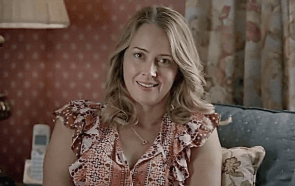 Denise (Amy Acker) supports her husband's public praying, in "Average Joe." (GND Media Group and Provisions Film Supply)