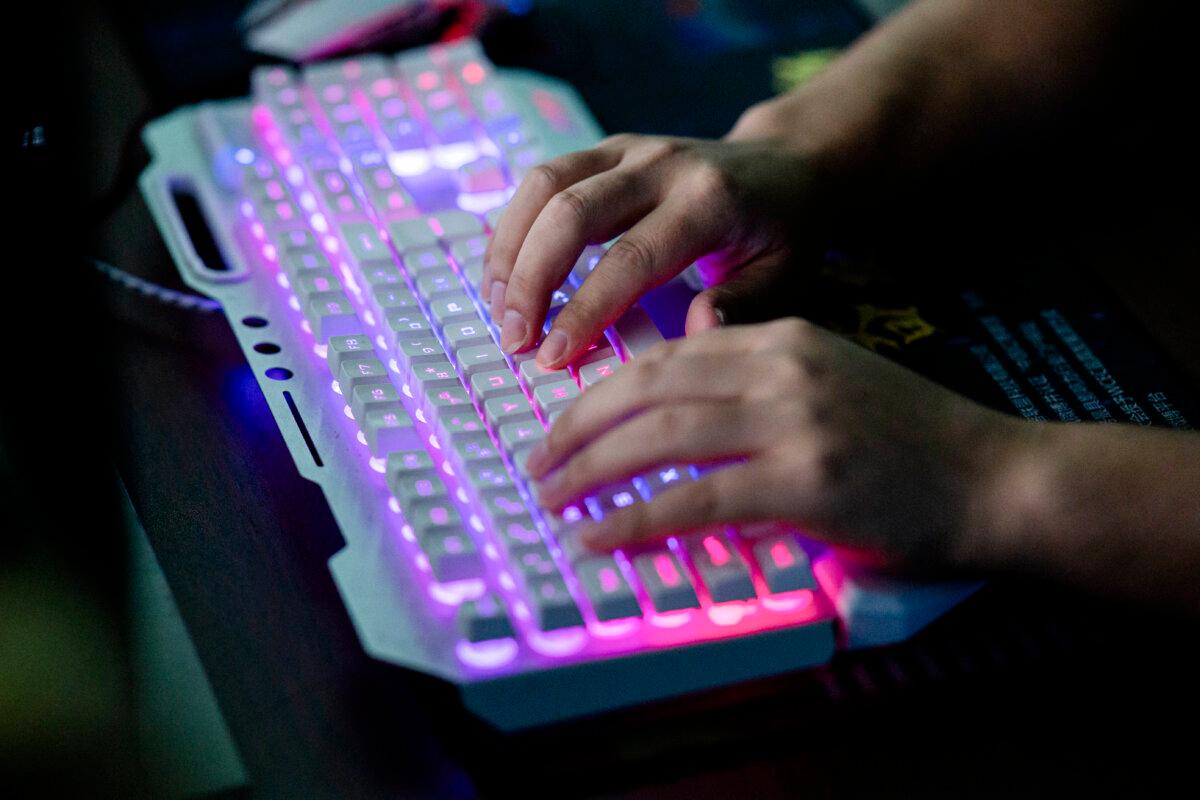 A member of a hacking group is using his computer at their office in Dongguan, Guangdong province, China, on Aug. 4, 2020. (Nicolas Asfouri/AFP via Getty Images)