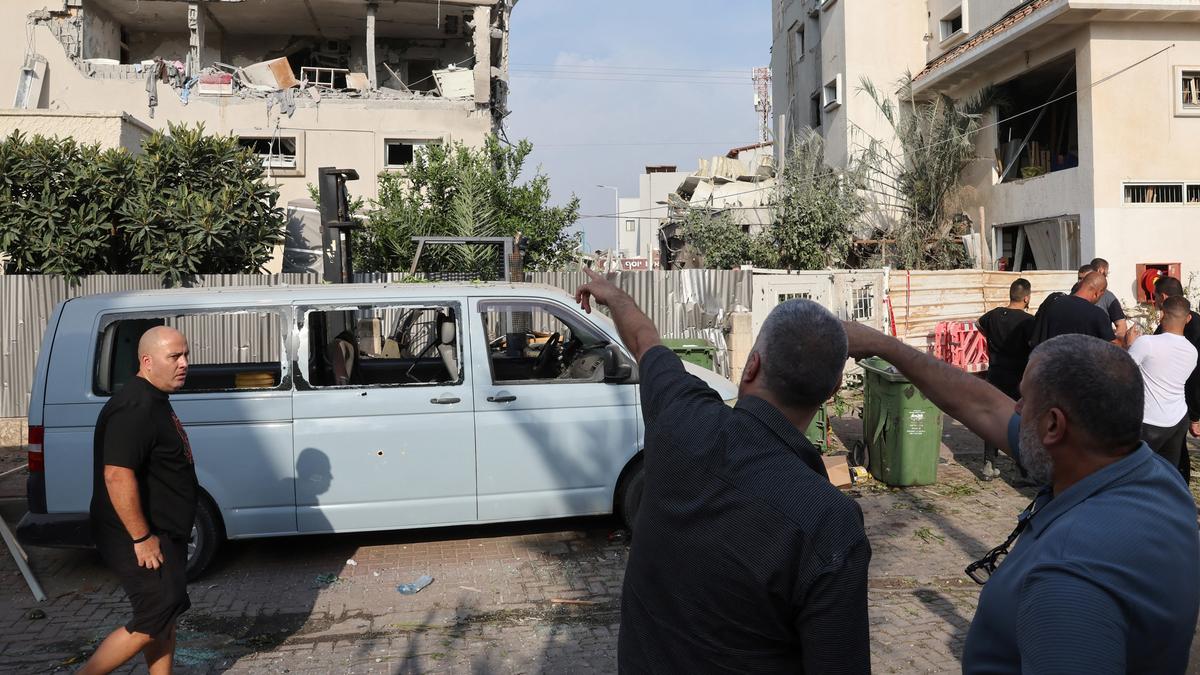 Attack on Central Israel Injures 11 as Iran’s Leader Promises a Punishing Response