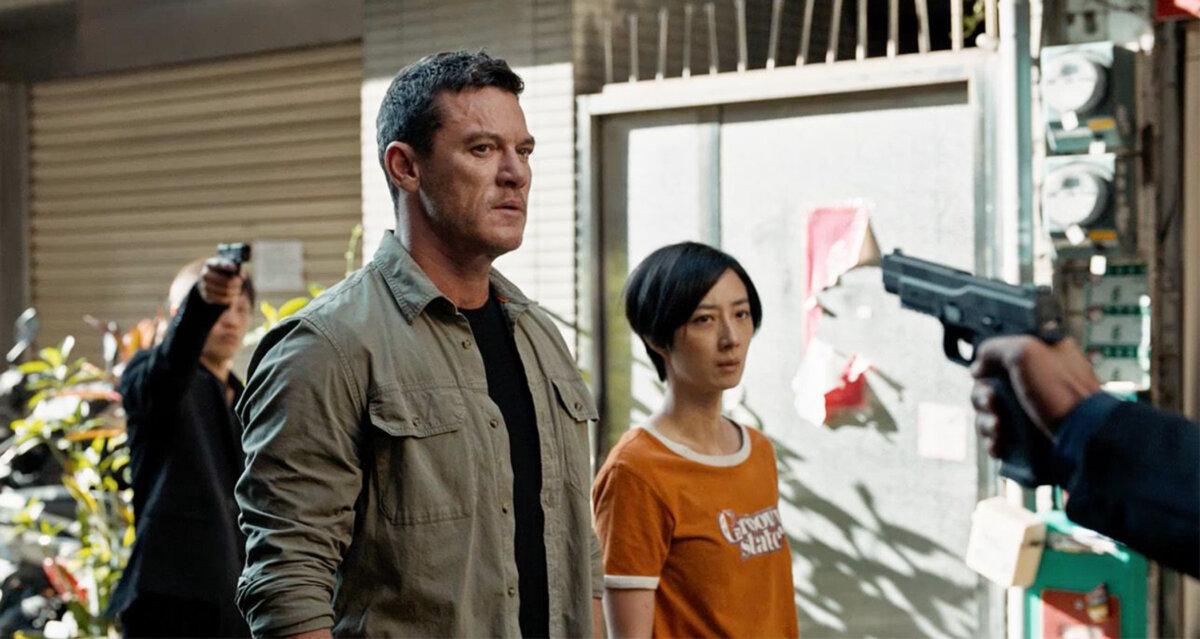 John Lawlor (Luke Evans) and his old flame Joey (Lun-Mei Gwei) get into some trouble, in “Weekend in Taipei.” (Huayu International Entertainment)