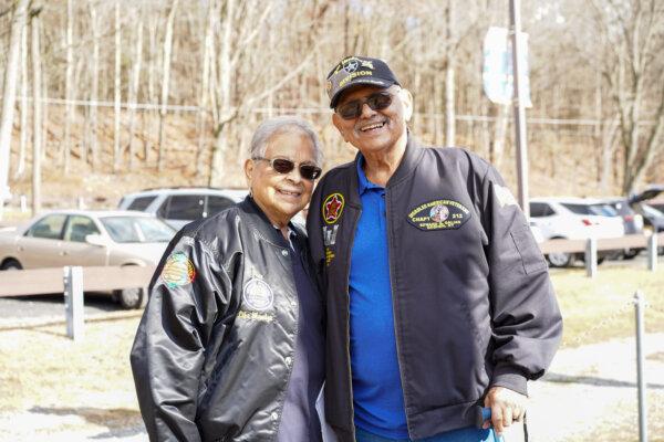 (L–R) Frances and Leo Ortiz in Veterans Memorial Park in Otisville, N.Y., on Nov. 11, 2024. (Cara Ding/The Epoch Times)