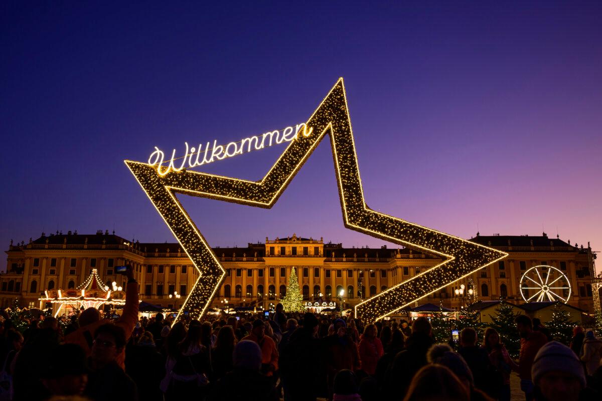 People crowd the Christmas market in front of Schoenbrunn castle in Vienna, Austria, on Nov. 16, 2024. (Christian Bruna/AP Photo)