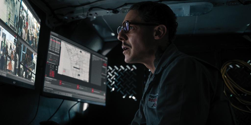 The "Mysterious Watcher" (Theo Rossi), in "Carry-On." (Netflix)