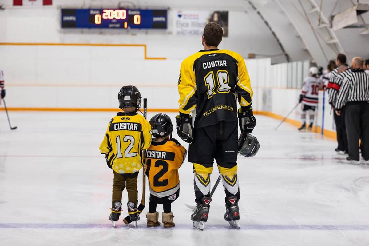 Cole Cusitar and his kids on the ice. (Courtesy of Jonathan Jensen)