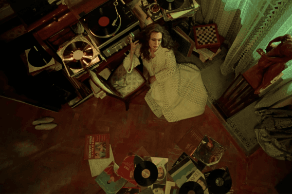 Maria Callas (Angelina Jolie) reliving old glories in her bedroom, in "Maria." (Netflix)