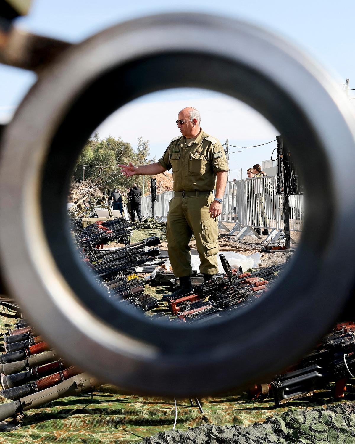 Day in Photos: Seized Hezbollah Weapons, Nissan and Honda Merger, Santa Goes on a Christmas Journey