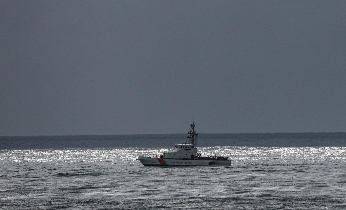 Body Parts Found Washed Up on Shore Amidst Search for 2 Missing Men